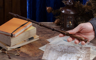 A wooden magic wand in brown with delicate carvings